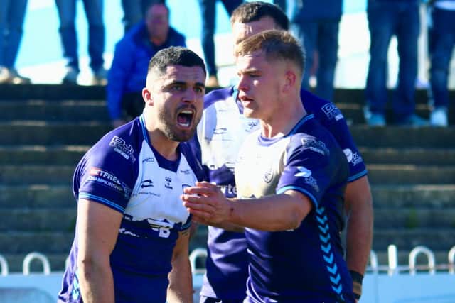 Hat-trick hero Caleb Aekins celebrates one of his three tries for Featherstone Rovers against London Broncos. Picture: Kevin Creighton