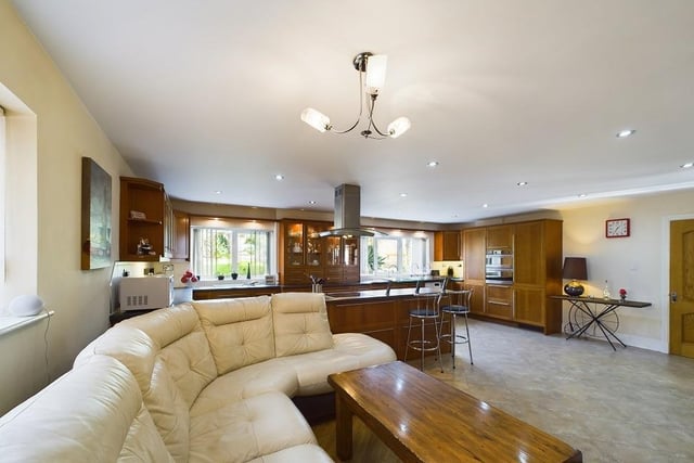 The open plan interior with versatile family or reception space.
