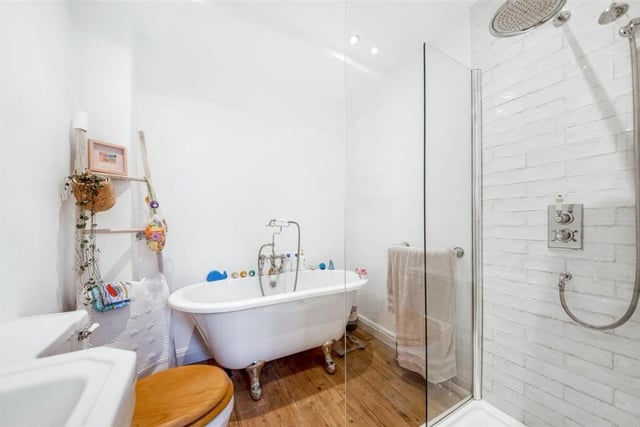 This property’s bathroom has a fabulous four piece suite including a fixed glazed screen shower with superb fittings, a period style double ended bath upon chrome feet with a Victorian style handheld mixed attachment with a shower unit over, a low level W.C with polished timber seat and a pedestal wash hand basin.