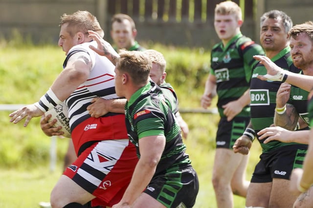 Clark Thompson charges forward for Normanton Knights.