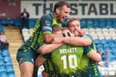 Featherstone Rovers celebrate a try in their big game against Oldham. Picture: Kevin Creighton