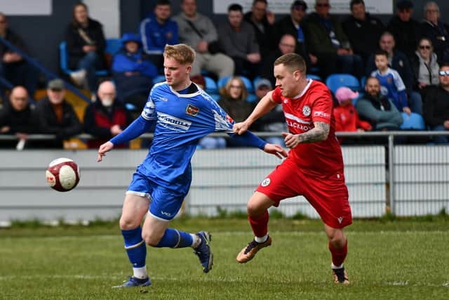 Hayden Lindley tries to get away from a Grimsby Borough defender. Picture: Daniel Kerr