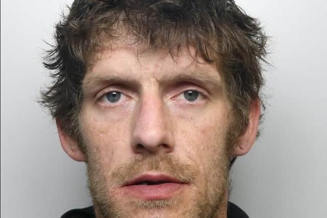 Andrew Holland, 36, is wanted for offences including burglary, theft