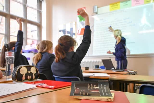 Hundreds of thousands of teachers across England and Wales will walk out again tomorrow after voting to strike in a dispute over pay.