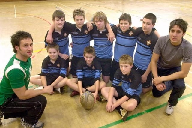 PE teacher Rob Hume (left) with his Rugby players. Front l-r: Nick Mitchell, Jack Manners, Aodhan Brownlee. Back l-r: Peter Crook, Joel Pitts, Charlie Stockhill (Ossett School's team captain), Don Petrie, Ryan Baker and Mr. Gregg Jowitt.