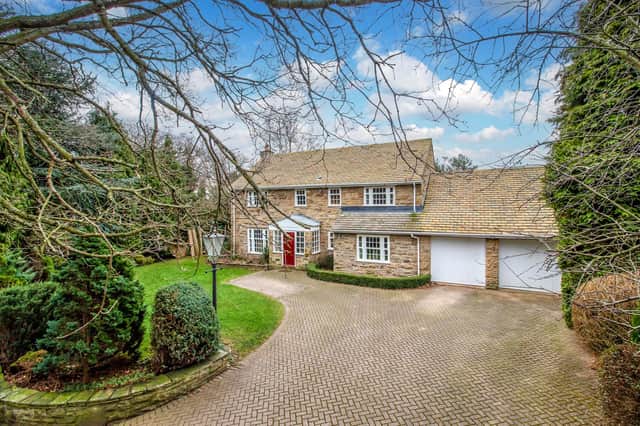 The attractive property has a large driveway and an integrated double garage.