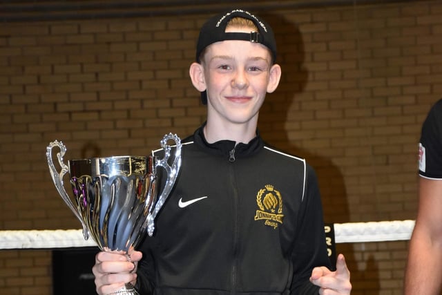 Wyatt Holden, representing Jonny's Gym, Barnsley, with the Fight of the Night trophy he won.