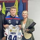 Harvey Smith, who is a student at Brigshaw High School, pictured with his parents following his Rugby League debut
