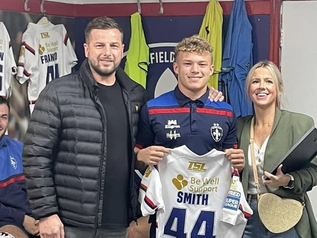 Harvey Smith, who is a student at Brigshaw High School, pictured with his parents following his Rugby League debut