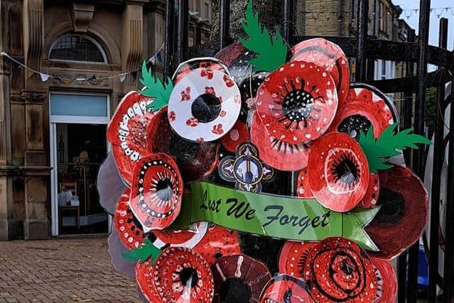 Pupils at Ossett Academy created a poppy wreath that was put up in the precinct.