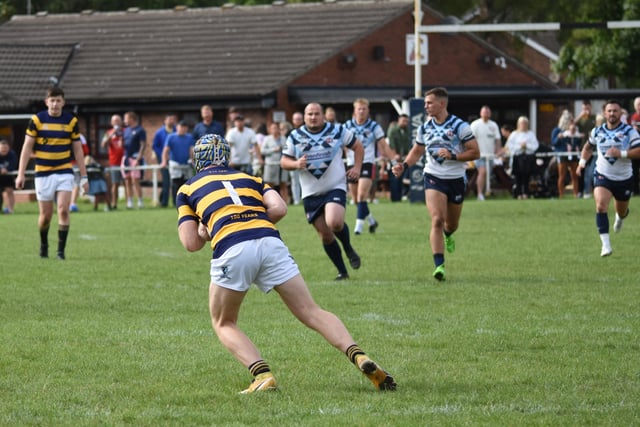 Knights players chase down the Clock Face Miners' full-back after he field the ball. Picture: Rob Hare