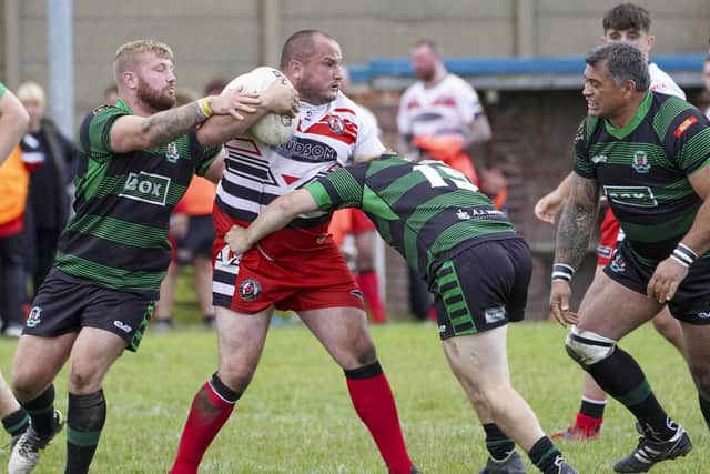Stuart Biscomb in the thick of the action for Normanton Knights against Milford. (Photo by Scott Merrylees)