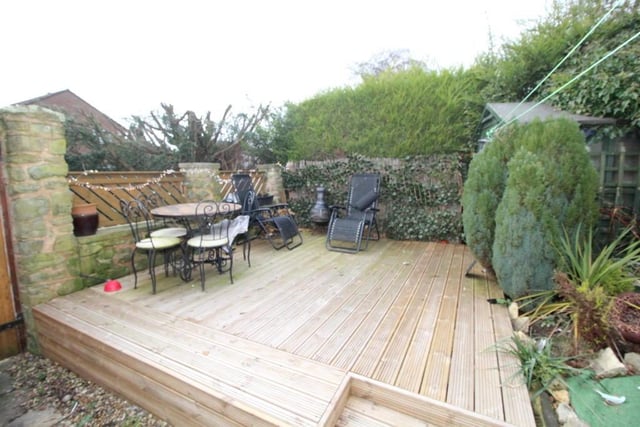 A decked seating area, ideal for the summer months, in the rear garden.