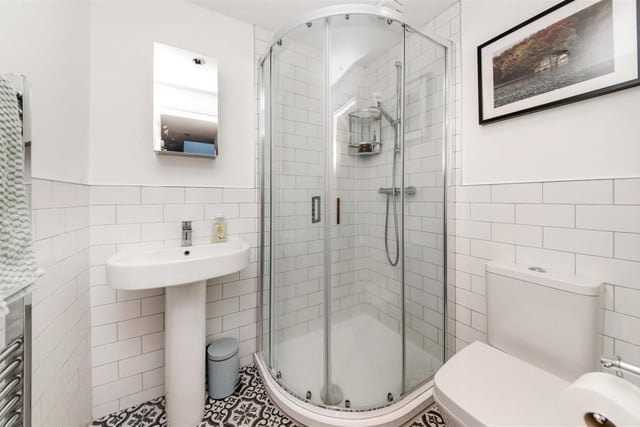 The ground floor shower room features a modern white three-piece suite.