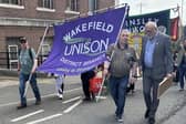 Jon Trickett with striking workers from the National Coal Mining Museum at the ‘Banners Held High’ festival in Wakefield.
