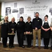 Damien Wood (centre), General Manager at Notcutts Victoria Garden Centre alongside colleagues in the new refurbished restaurant. [Credit: Peter Hasnip, Copyright: Notcutts Ltd]