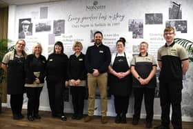 Damien Wood (centre), General Manager at Notcutts Victoria Garden Centre alongside colleagues in the new refurbished restaurant. [Credit: Peter Hasnip, Copyright: Notcutts Ltd]