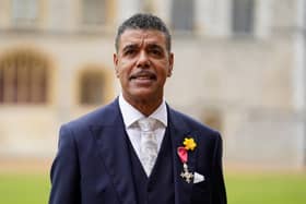 Footballer turned pundit and TV presenter Chris Kamara has made the appearance of a lifetime at Windsor Castle where he has received his MBE from the Prince of Wales. (Getty)