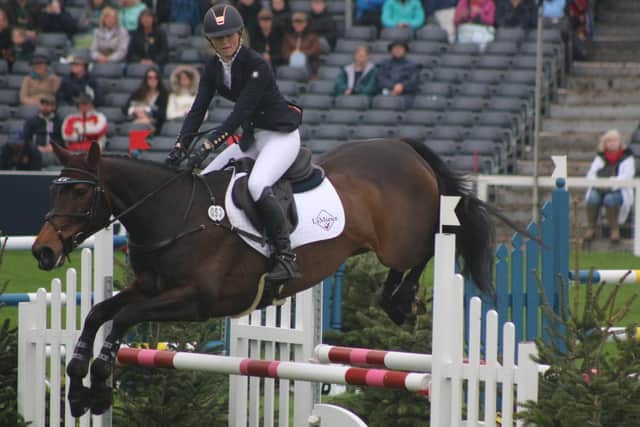 Kristina Hall-Jackson in show jumping action during her debut at the Badminton Horse Trials.