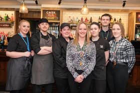 Manager Sarah Gill and staff at the newly-refurbished The Singing Chocker.