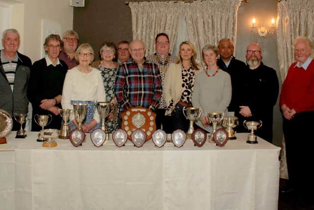 Members of Ossett and District Camera Club with trophies at their annual presentation evening held at Dimple Wells Lodge Hotel, Ossett.
