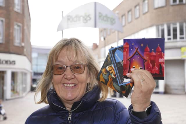 Jill Farringdon is looking for volunteerrs to help sell charity Christmas Cards.