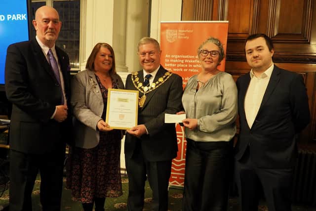 Business owners and community groups received awards in recognition of their contributions to improve the city.