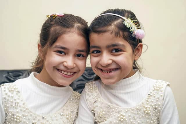 Habeeb Faqirzai is unable to find a dentist in Wakefield for his daughters Yusra and Madina. Picture Scott Merrylees