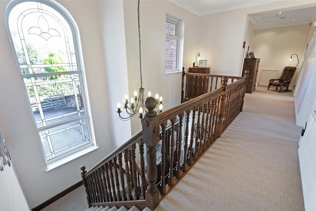 The first floor landing has the open staircase and balustrade, double glazed windows and a central heating radiator.