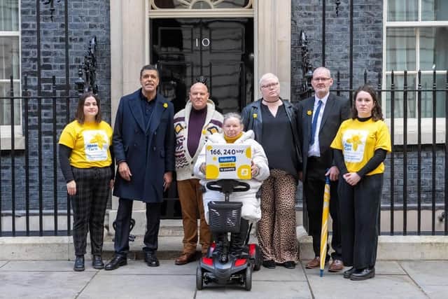Chris Kamara MBE joined other campaigners to hand in a petition to Downing Street calling for improved financial support for people with a terminal illness.