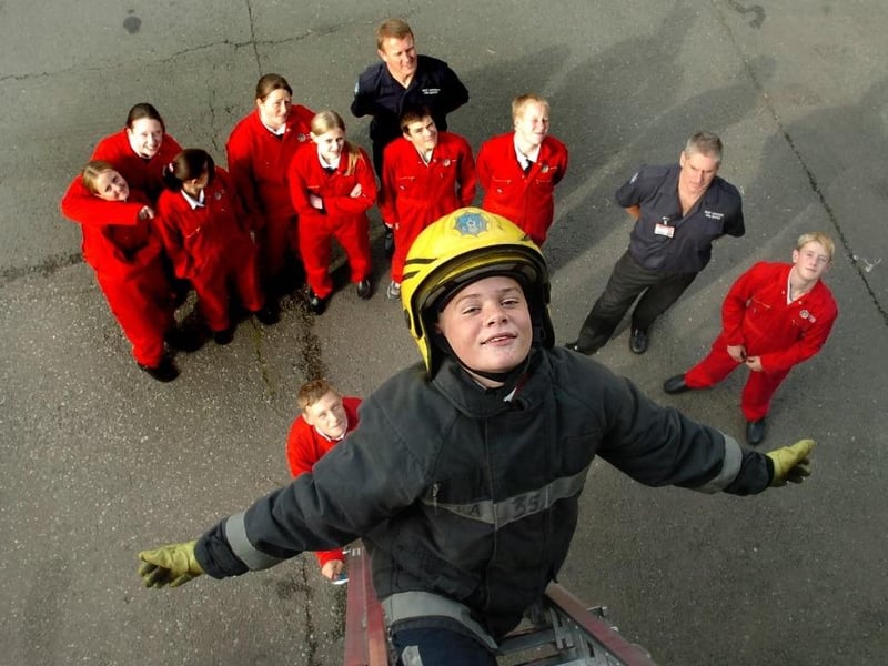 Cathedral High School pupils doing youth fire training at Wakefield Fire Station. Paul Randall in fire kit.