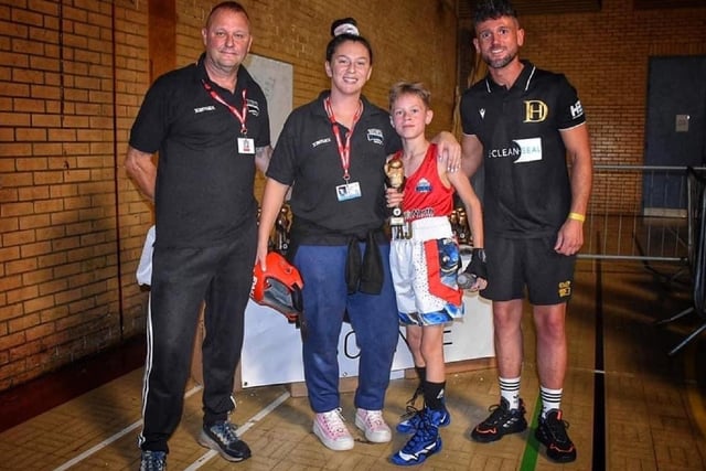 White Rose's Alfie Sweeting with Wakefield professional boxing star Dom Hunt and his coaches after receiving a trophy following his first skills contest.