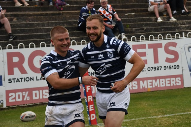Thomas Lacans and Connor Jones show their delight at scoring.