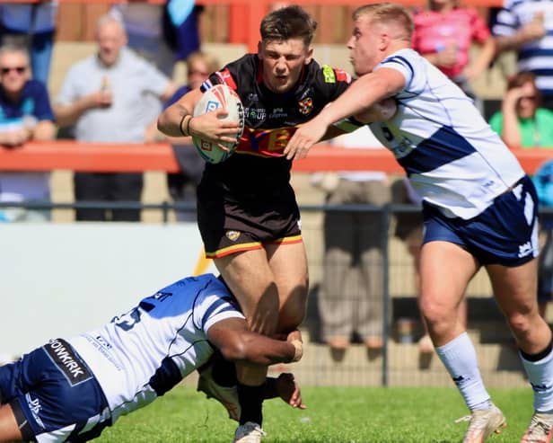 Action from Dewsbury Rams v Featherstone Rovers. Photo by Thomas Fynn.