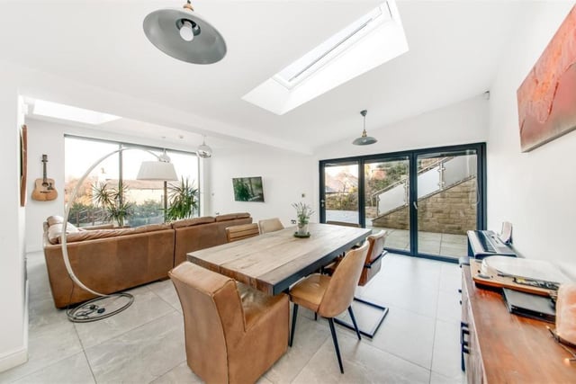 Family and dining areas with bi fold doors out to patio space - perfect for entertaining and indoor to outdoor living.