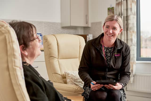 WDH Mental Health Navigator speaking with a tenant