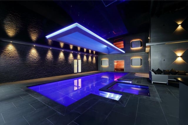 This incredible pool featuresa bespoke bar with bottle fridge, Quooker tap and Sink, changing room with two shower cubicles and toilets, dance studio/gym area with LED lighting that can be synced to your music, Lutron controlled blinds, a sauna, a stainless steel pool with a maximum depth of two metres and approximate length of 15 meters, and spa pool.