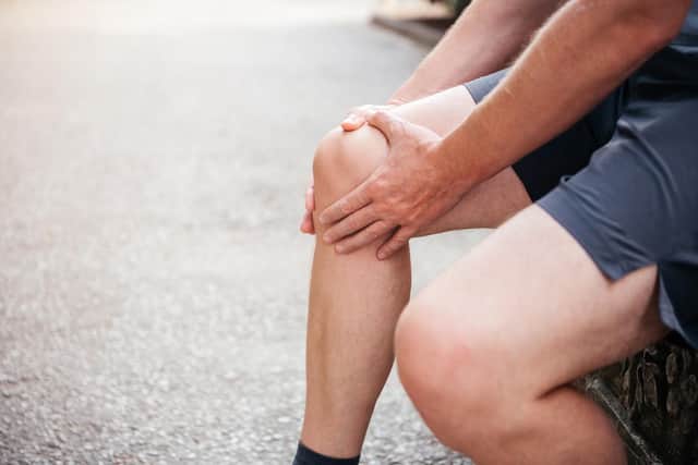 Patella-femoral pain often comes on after the run and people then find it hurts when going up and down stairs, squatting, or sitting for a long period with bent knees. Photo: AdobeStock