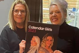 Rachel Brown and Kate Challinor with their calendar which will raise funds for Pontefract and District Breast Cancer Support Group.
