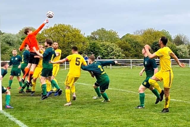 Goalmouth action from the Jim Callaghan Cup final.