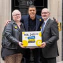 Marie Curie Ambassador Chris Kamara joined them in handing over the Dying in Poverty petition to 10 Downing Street.