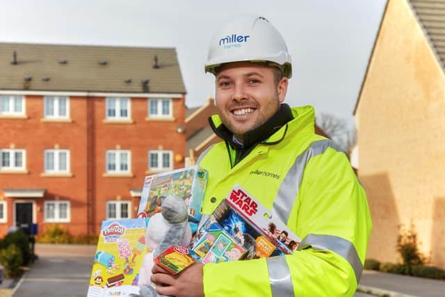 Miller Homes contracts manager Michael Ramsbottom, supports the toy appeal.