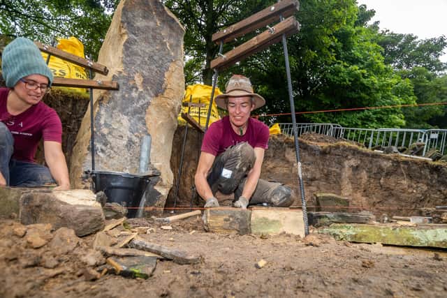 A group from the Women's International Stone Alliance are busy working on the Anne Lister monument in the grounds of Shibden Hall, Halifax.