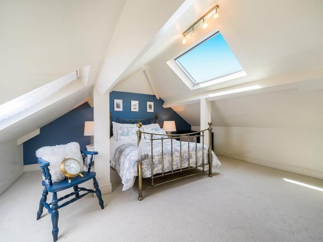 Upstairs, the first floor offers two further good-sized bedrooms, and a w.c.