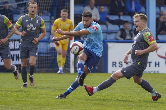 Nathan Curtis fires the ball forward for Ossett United in their last game of the season against Grantham Town.