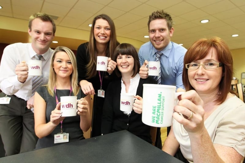 Elaine Hunt main organiser at Wakefield & District Housing Offices, raised nearly £8,000 for MacMillan by taking part in the charity's World's Biggest Coffee Morning. L-R Paul Wake, Rebecca Westerman, Amanda Hammonds, Luke Dixon, Lucy Winder, Elaine Hunt.
