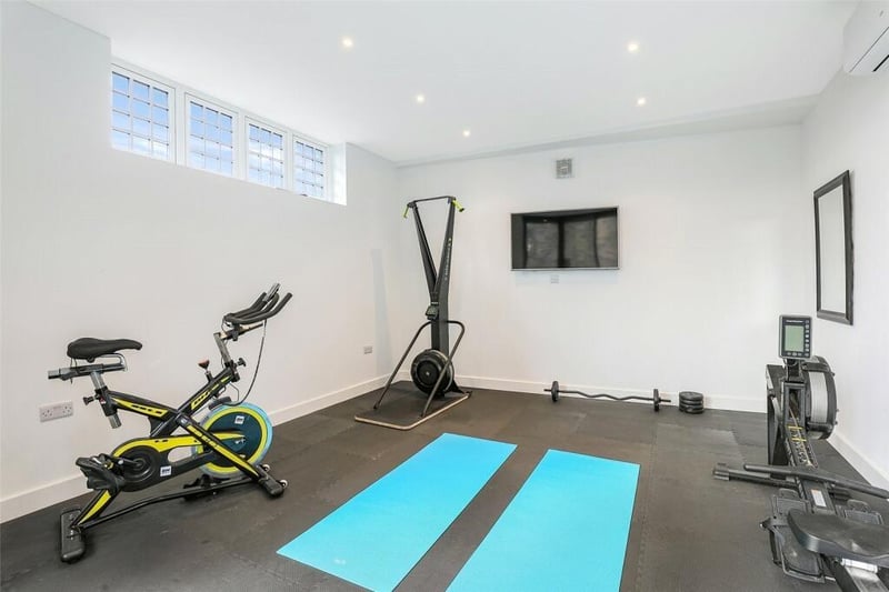 Also situated in the entertaining suite is a stunning home gym.