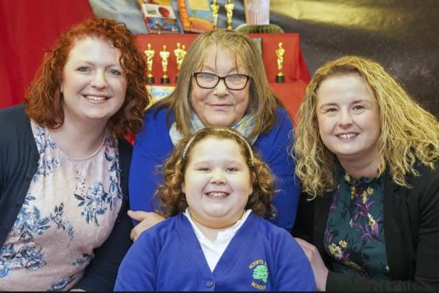 Evelyn Ashworth was helped by staff, Amy Rutherford, Sue Wilson and Fiona Blackstone at Altofts Junior School when she started to choke. Picture Scott Merrylees