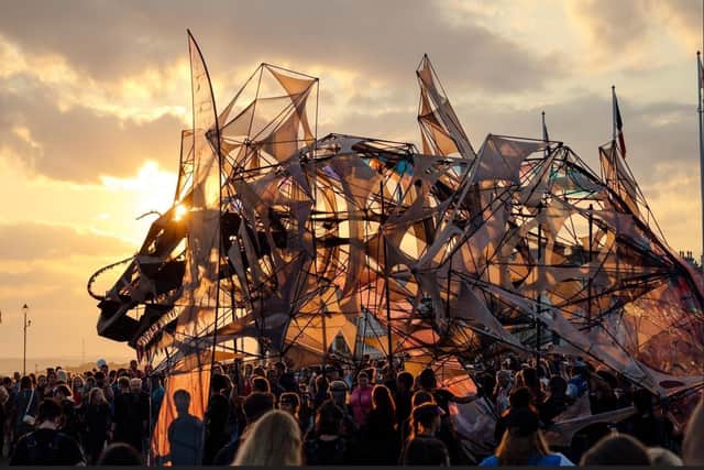 The Hatchling is a theatrical puppetry and kite flying performance that unfolds over a weekend of events. With a wingspan of more than 20 metres, it is the world’s largest human-operated puppet to fly. Image: Trigger
