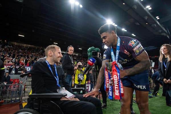 Kevin Naiqama thanks Rob Burrow after receiving the Harry Sunderland Trophy from Burrow's daughter Maya after St Helens' Grand Final victory over Catalans Dragons in 2021. Picture by Allan McKenzie/SWpix.com.
